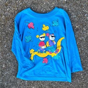 VINTAGE BLUE LONG SLEEVE TSHIRT WITH STUDENTS RIDING A RULER 4-6X